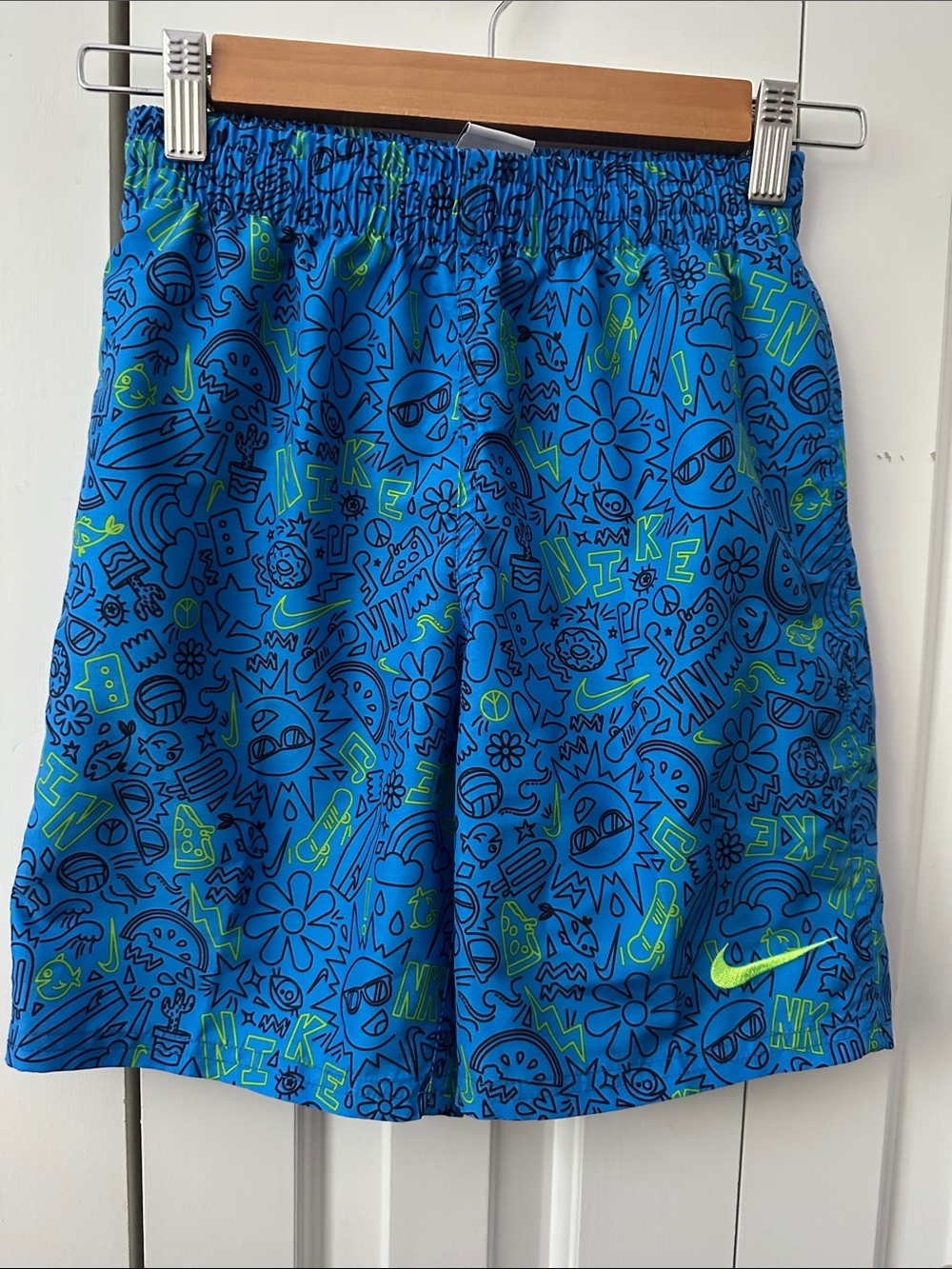 Nike Blue Graphic Kids Swim Shorts with Neon Green Accents